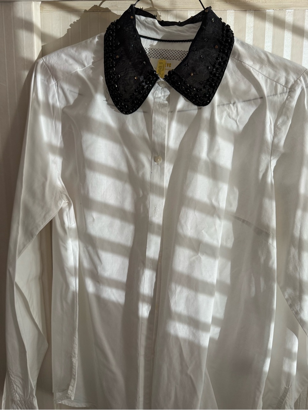 White Button-Up Shirt with Black Embellished Collar